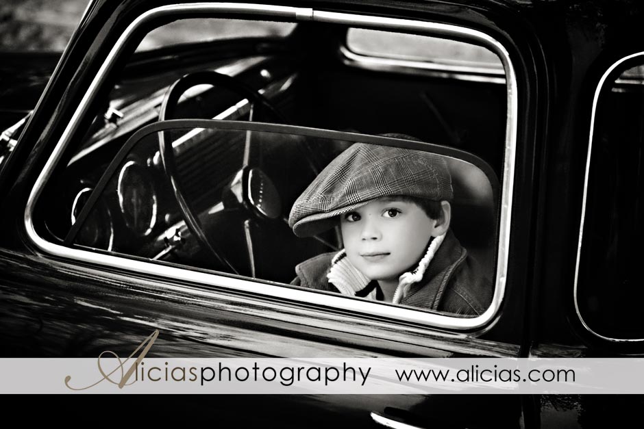 Naperville Children's Photographer...Boy in old truck black and white